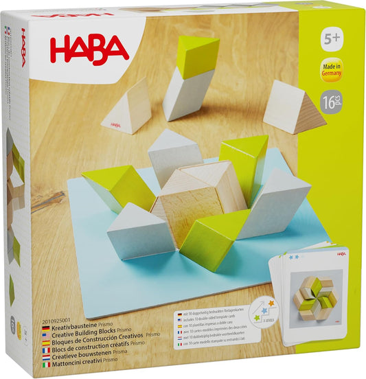 Wooden prism blocks with slanted sides stacked to match a pattern card