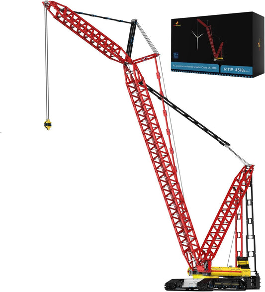 Large yellow brick crawler crane with long lattice boom and tracks