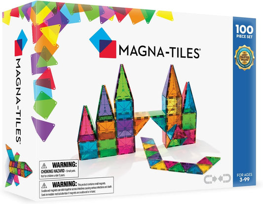 Colorful translucent magnetic tiles built into a tall tower and small house
