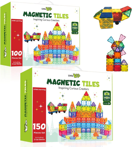Colorful magnetic tiles built into a tall castle and ramp with small magnetic cars