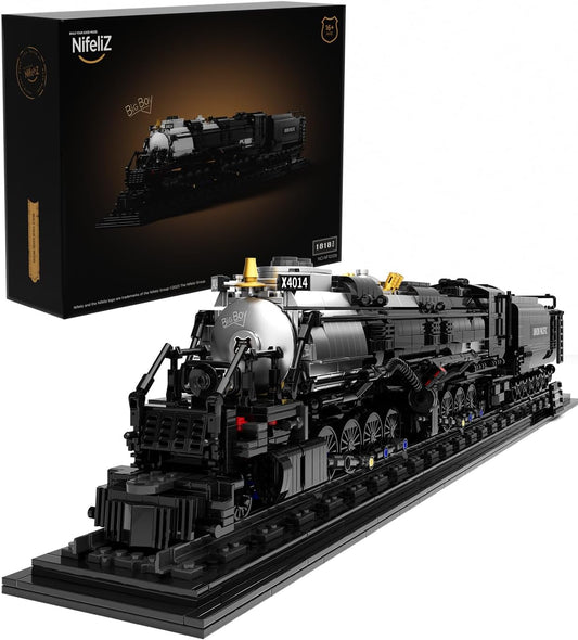 Long black brick-built articulated steam locomotive and tender on display track