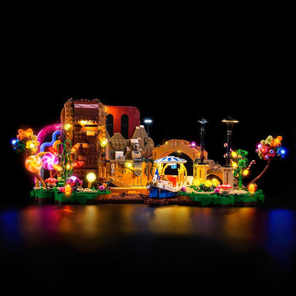 Candy factory brick model lit up with colorful LED lights from an add-on kit – view 2