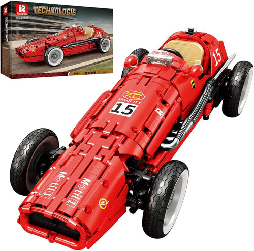 Brick-built retro open-wheel racing car with exposed engine and slick tires