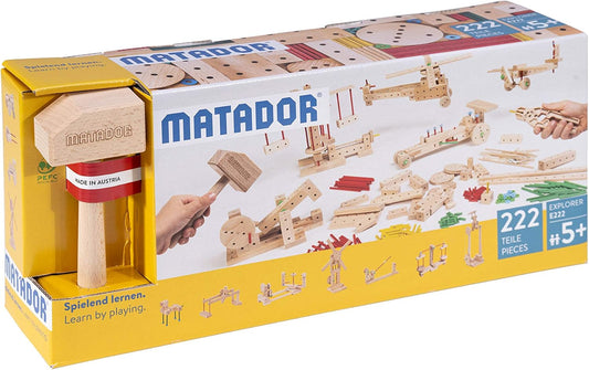 Wooden construction set pieces assembled into a small vehicle model