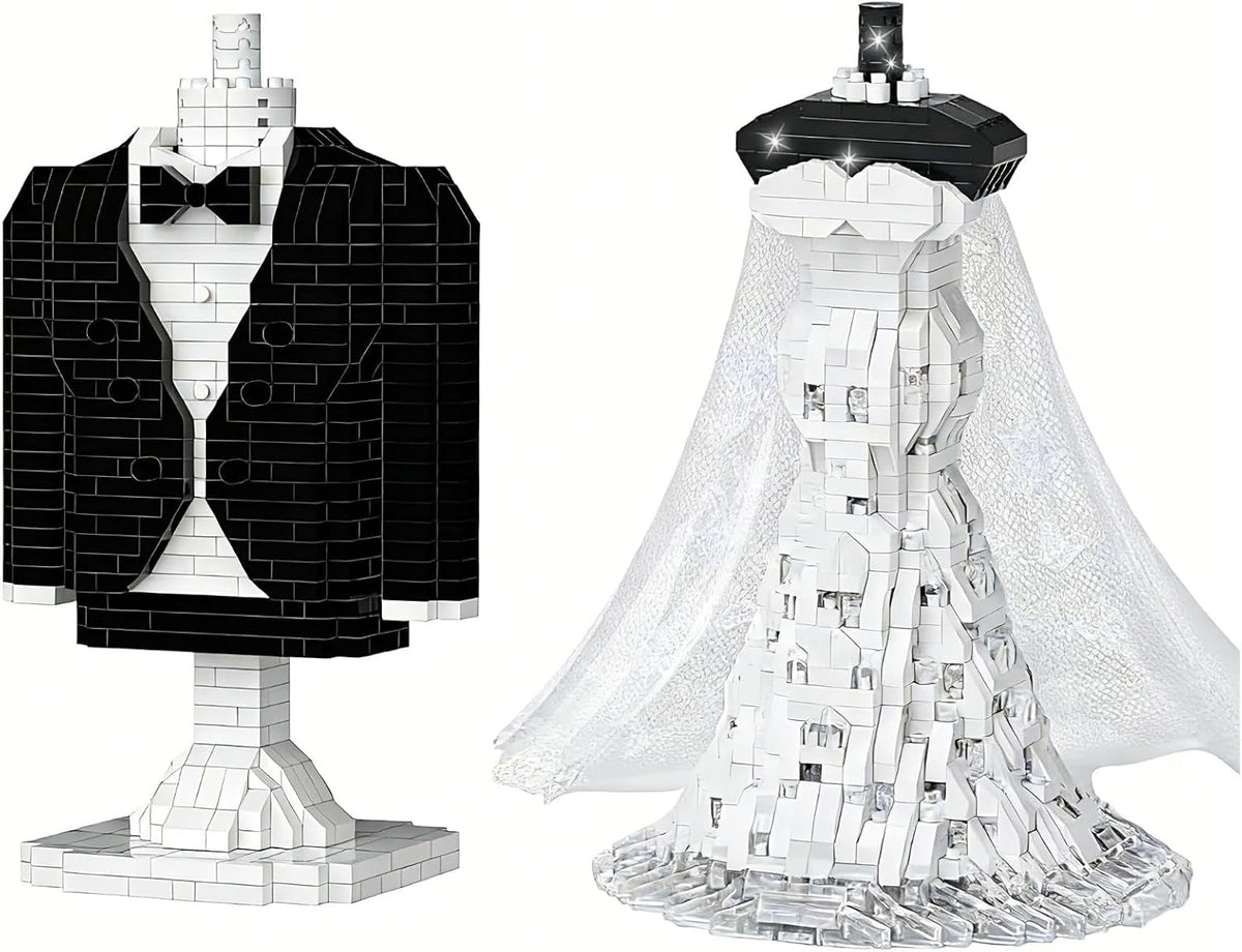 Brick-built bride in white fishtail dress and groom beside an I Love You sign