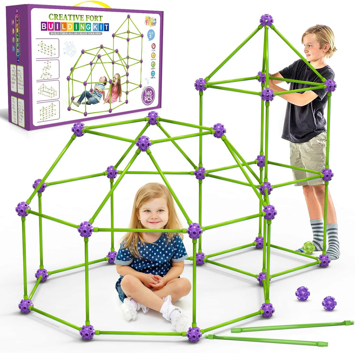 Child-sized fort made of rods and connector balls glowing green in a dark room – view 8