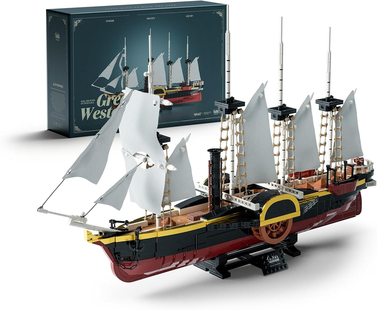 Brick model of a historic paddle steamship with sails and side paddle wheels