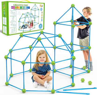 Child-sized fort made of rods and connector balls glowing green in a dark room – view 6