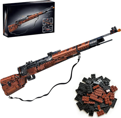 Full-size brick-built sniper rifle model displayed on a stand – view 3