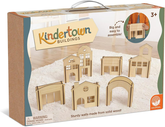 Wooden building blocks shaped like small town houses