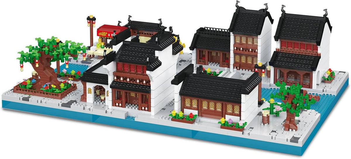 Two micro brick Jiangnan courtyard houses with white walls and dark tiled roofs – view 2