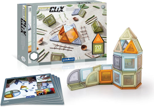Natural-tone magnetic building solids stacked into shapes beside inspiration cards