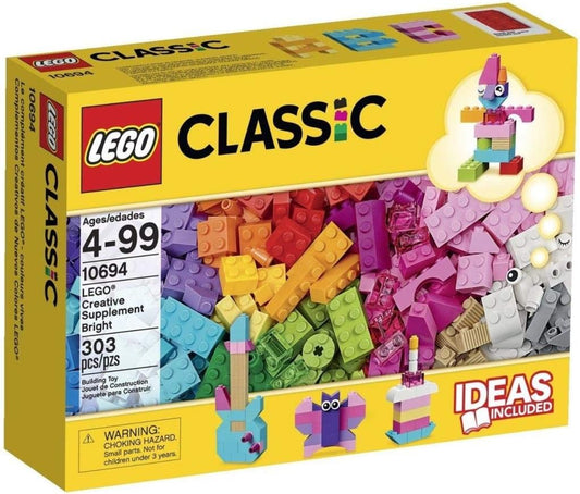 Assorted bright-colored building bricks spread out on a table