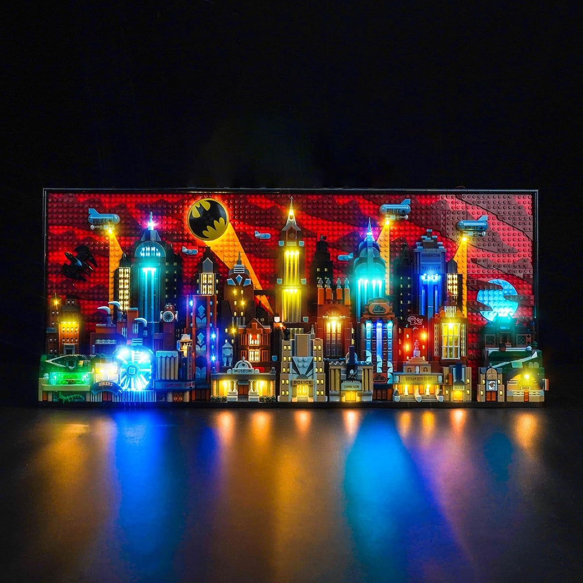 LED lights illuminating an animated superhero skyline brick model – view 2