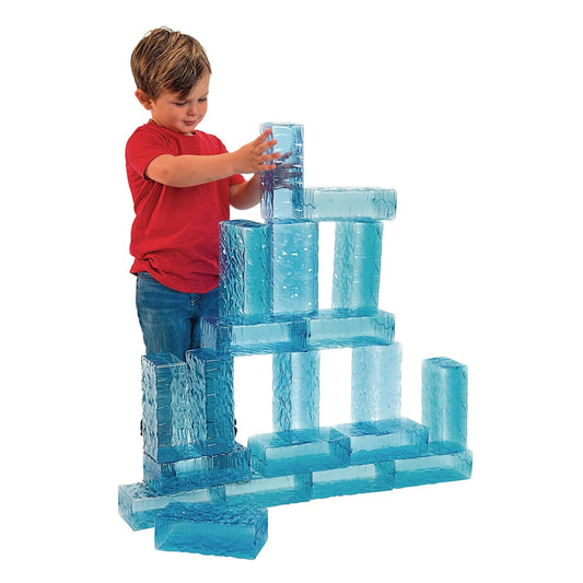 Stack of transparent turquoise ice-look building blocks glowing in light