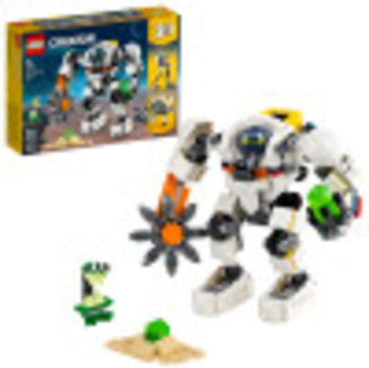 Brick-built space mining mech with buzz saw beside a green alien figure