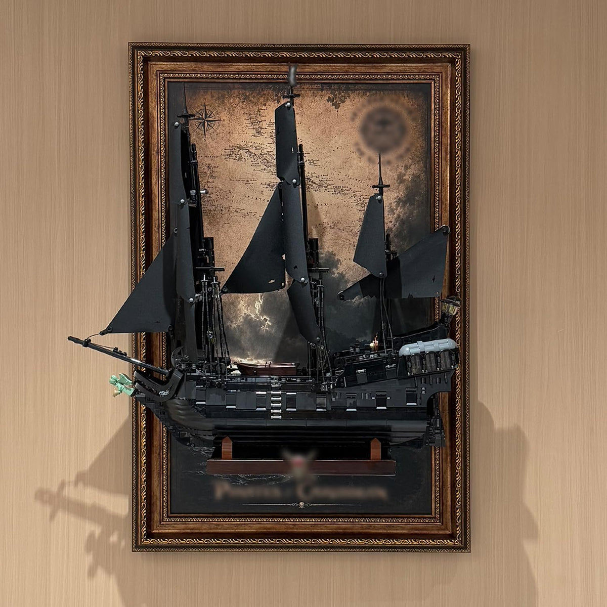 Pirate ship brick model mounted on a black wall display board