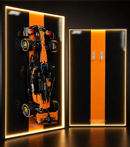 Formula race car brick model on a lit acrylic wall display board – view 4