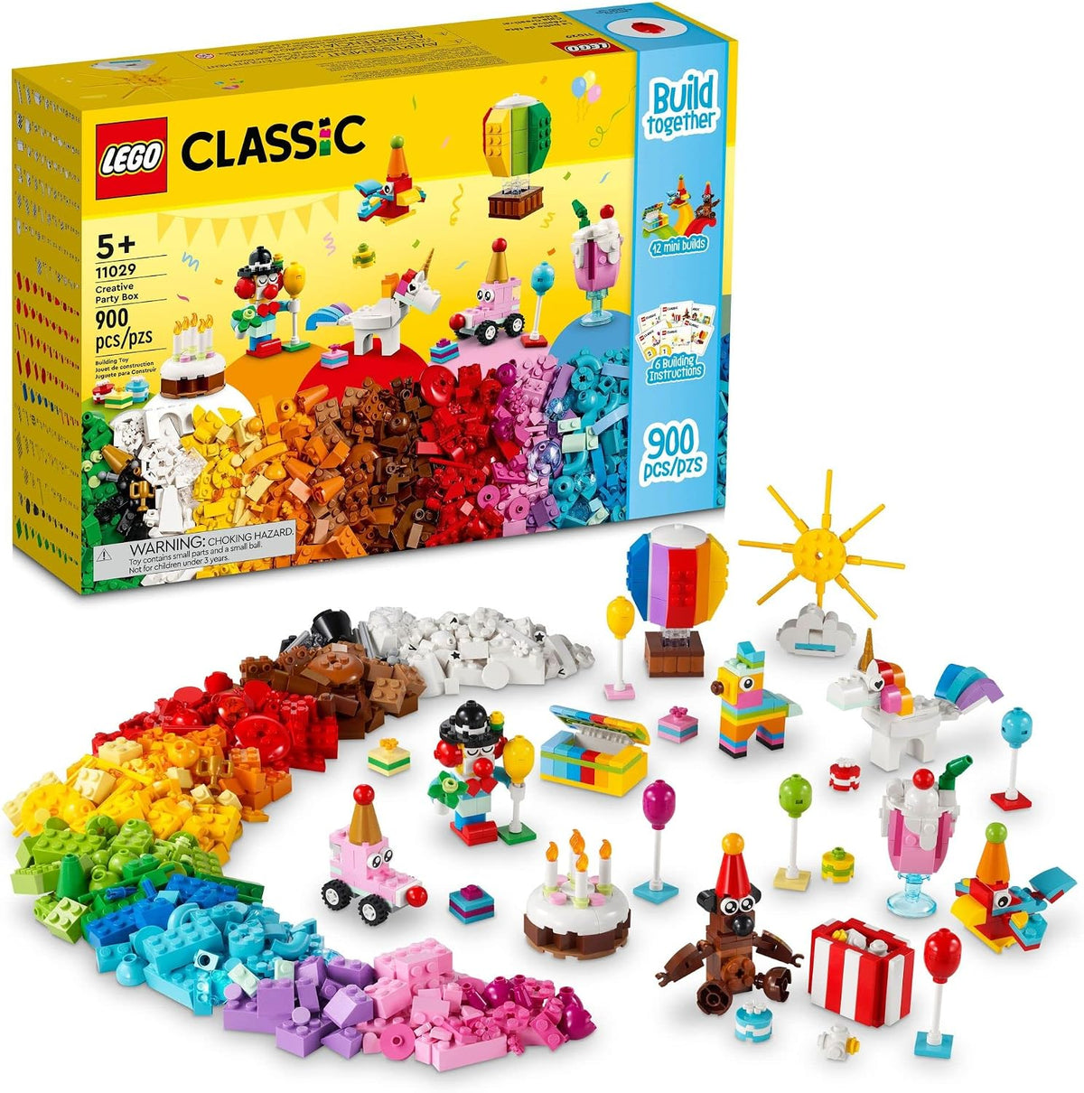 Storage box of colorful bricks with small built teddy bear, clown and unicorn models