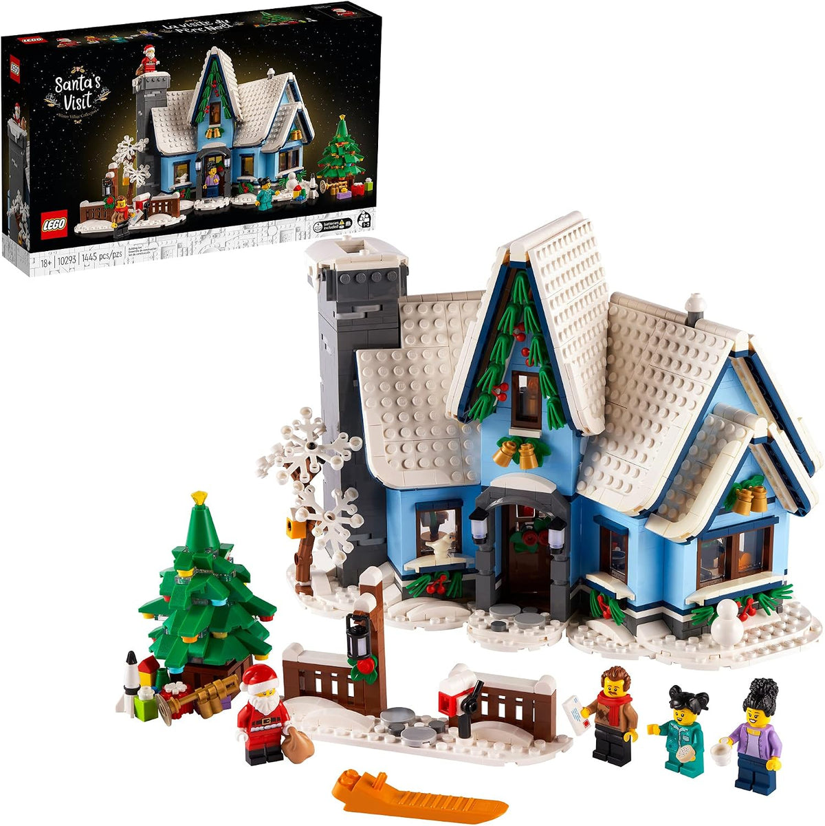 Built Christmas house brick model with lit tree, chimney and Santa figure