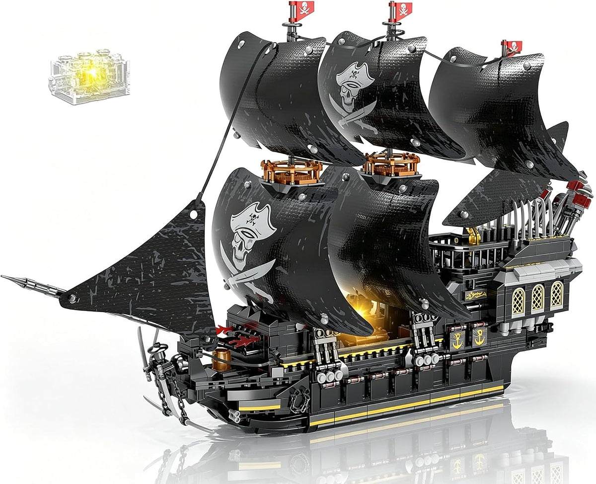 Brick-built pirate ship with sails and glowing LED lights resting on a display stand