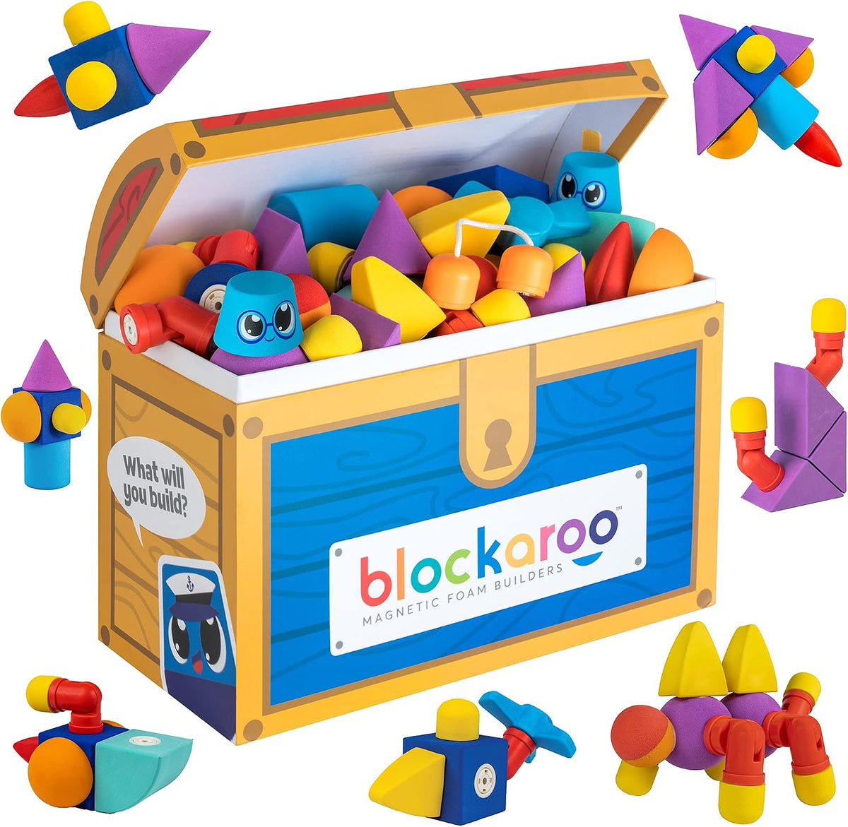Soft colorful magnetic foam blocks connected into a small tower beside a storage chest