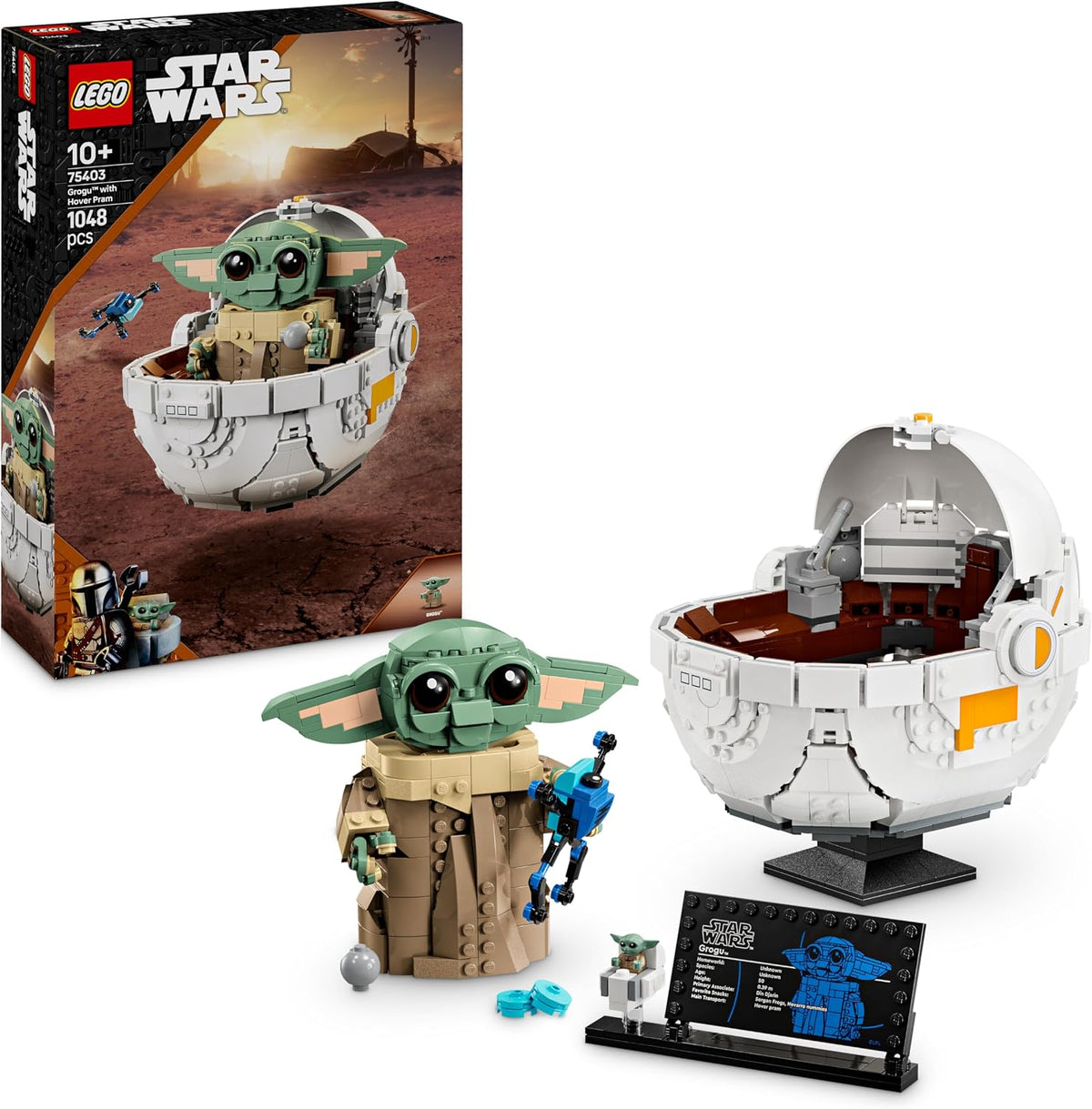 Built green alien child brick figure with large ears sitting in a round hover pram
