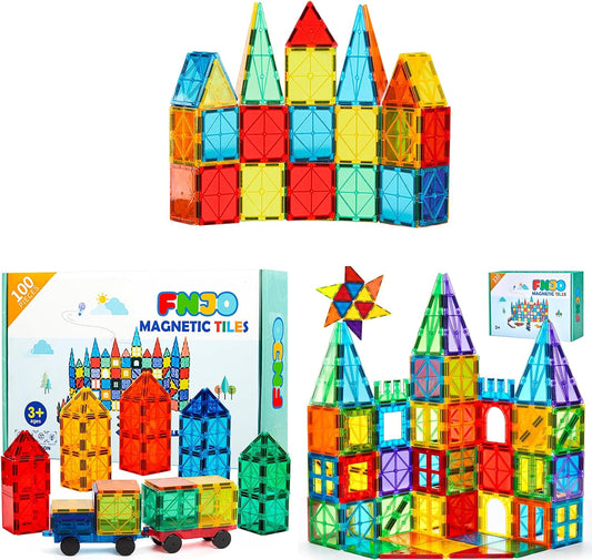 Large pile of colorful magnetic tiles built into towers