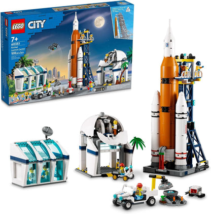 Brick-built white multistage rocket on a launch tower beside a domed observatory and control center – view 2