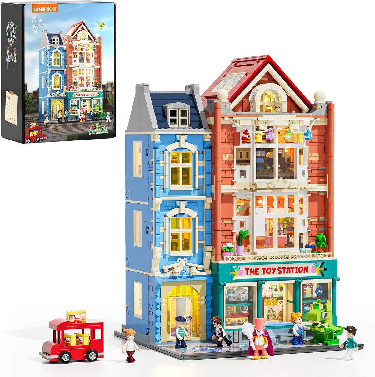 Brick toy store building with lit shop windows and colorful toys on display