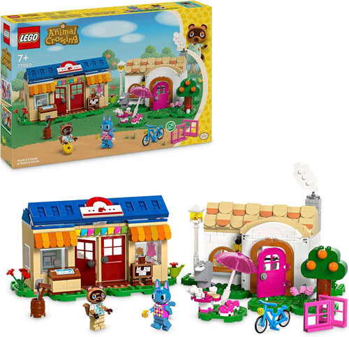 Brick village shop and cottage with two animal character figures