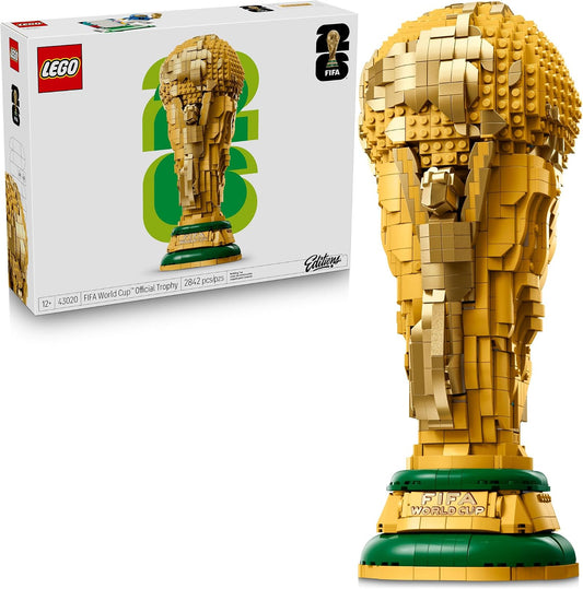 Gold brick-built soccer trophy with globe on top and green base