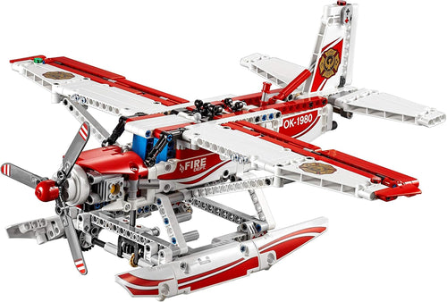 Red and white firefighting plane brick model with propeller and water-drop hatch