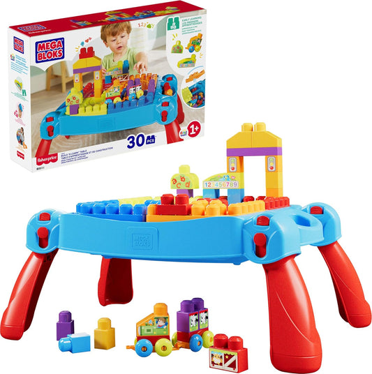 Blue toddler activity table with chunky colorful building blocks stacked on top