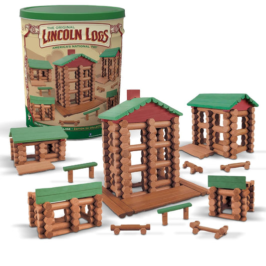 Wooden toy log cabins built into a small village scene