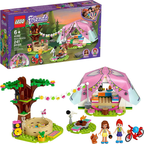 Brick-built forest glamping tent with hot tub, bicycle and mini-doll figure