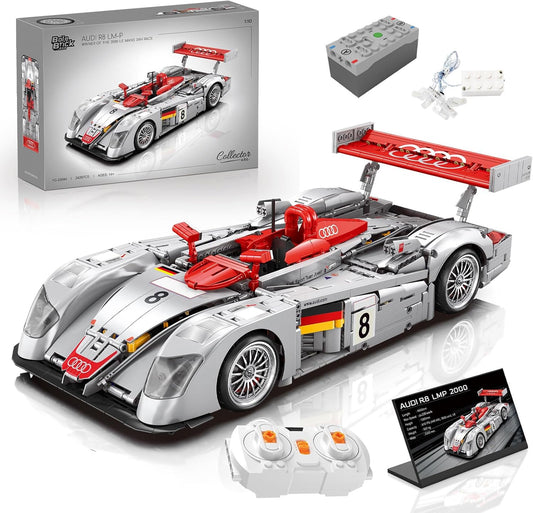 Silver brick-built open-cockpit endurance race car with large rear wing at 1:10 scale