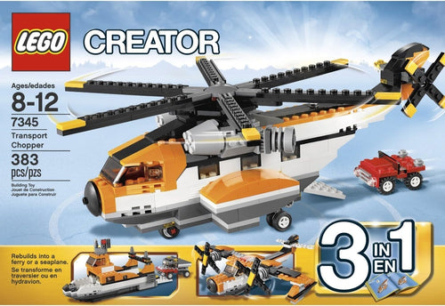 Brick-built red and white transport helicopter with twin rotors and lowered back ramp