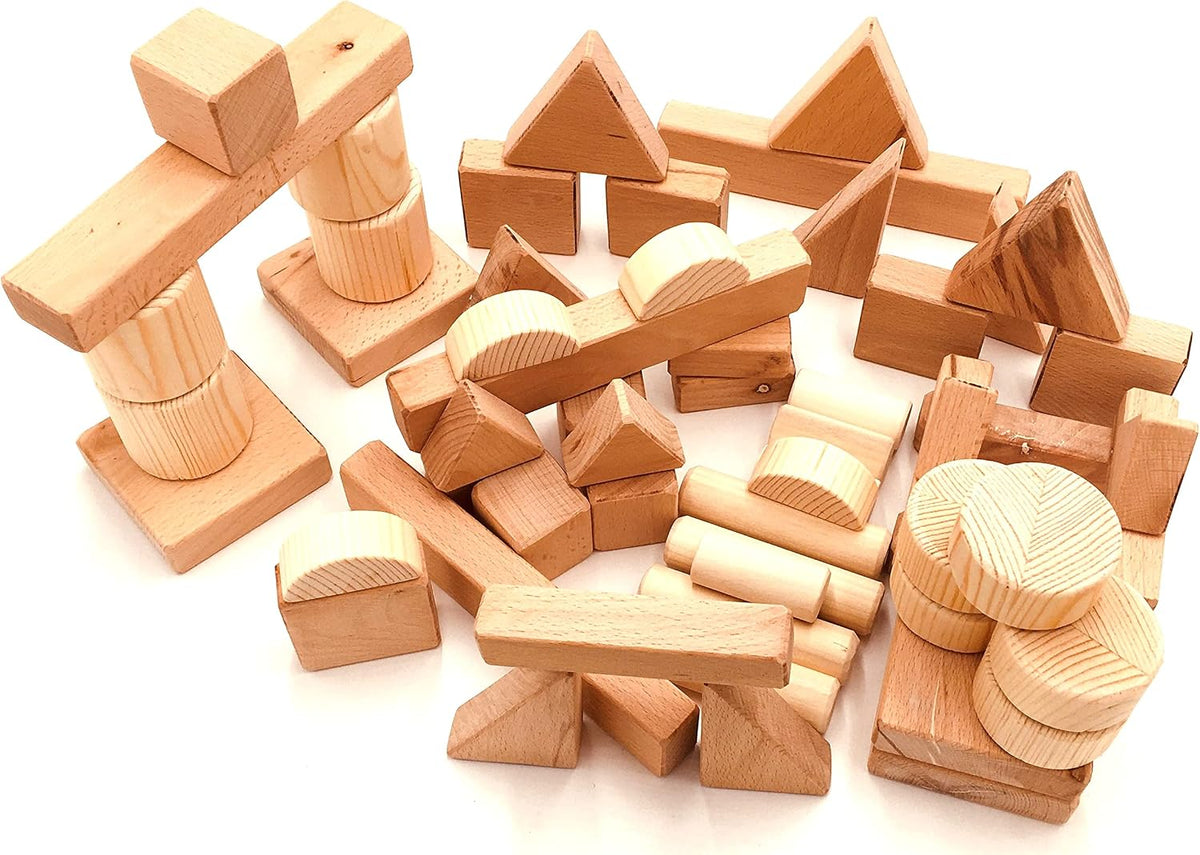 Unfinished natural hardwood building blocks stacked into a small tower