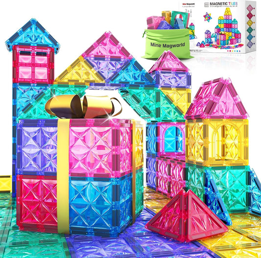 Candy-colored magnetic tiles built into a small tower and flat shapes