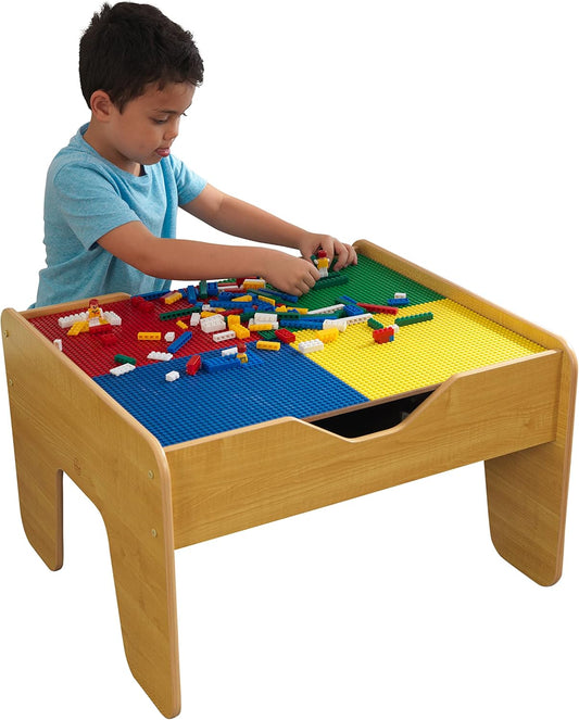 Natural wood kids activity table with brick-building top, colorful bricks and train set