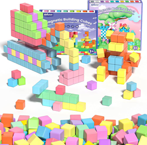 Colorful magnetic building cubes stacked into towers and shapes