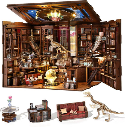 Lit fantasy castle book nook diorama standing between books on a shelf – view 16