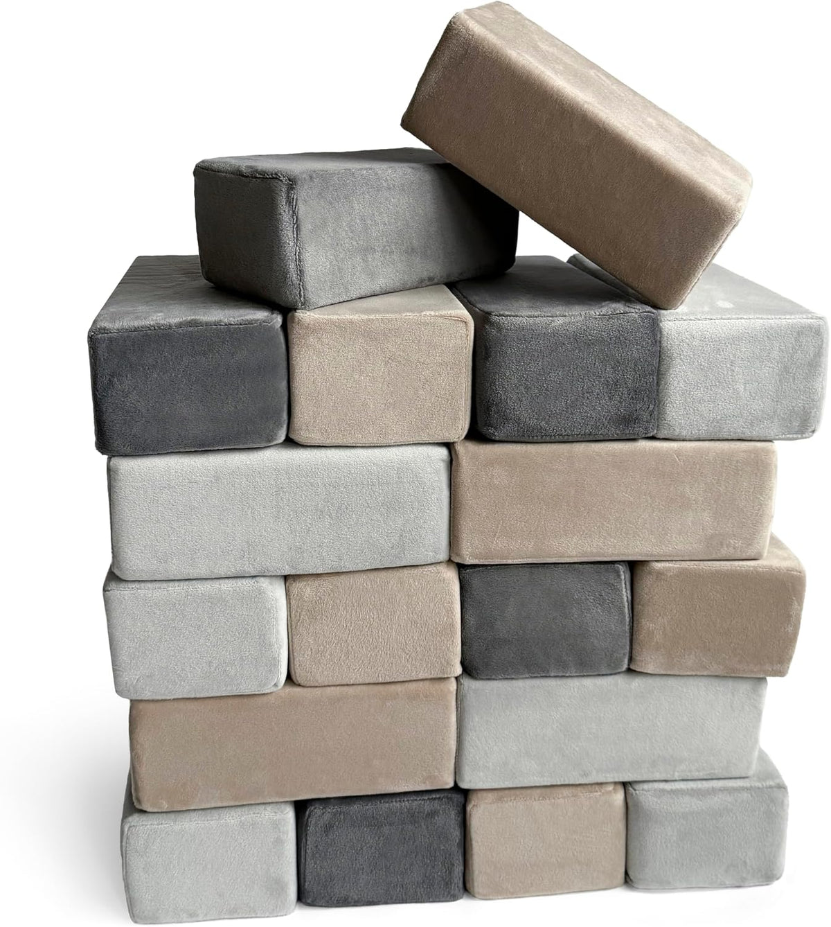 Soft fabric-covered foam blocks stacked into a castle