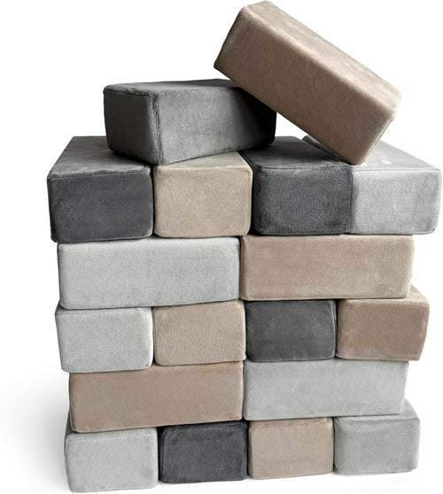 Soft fabric-covered foam blocks stacked into a castle