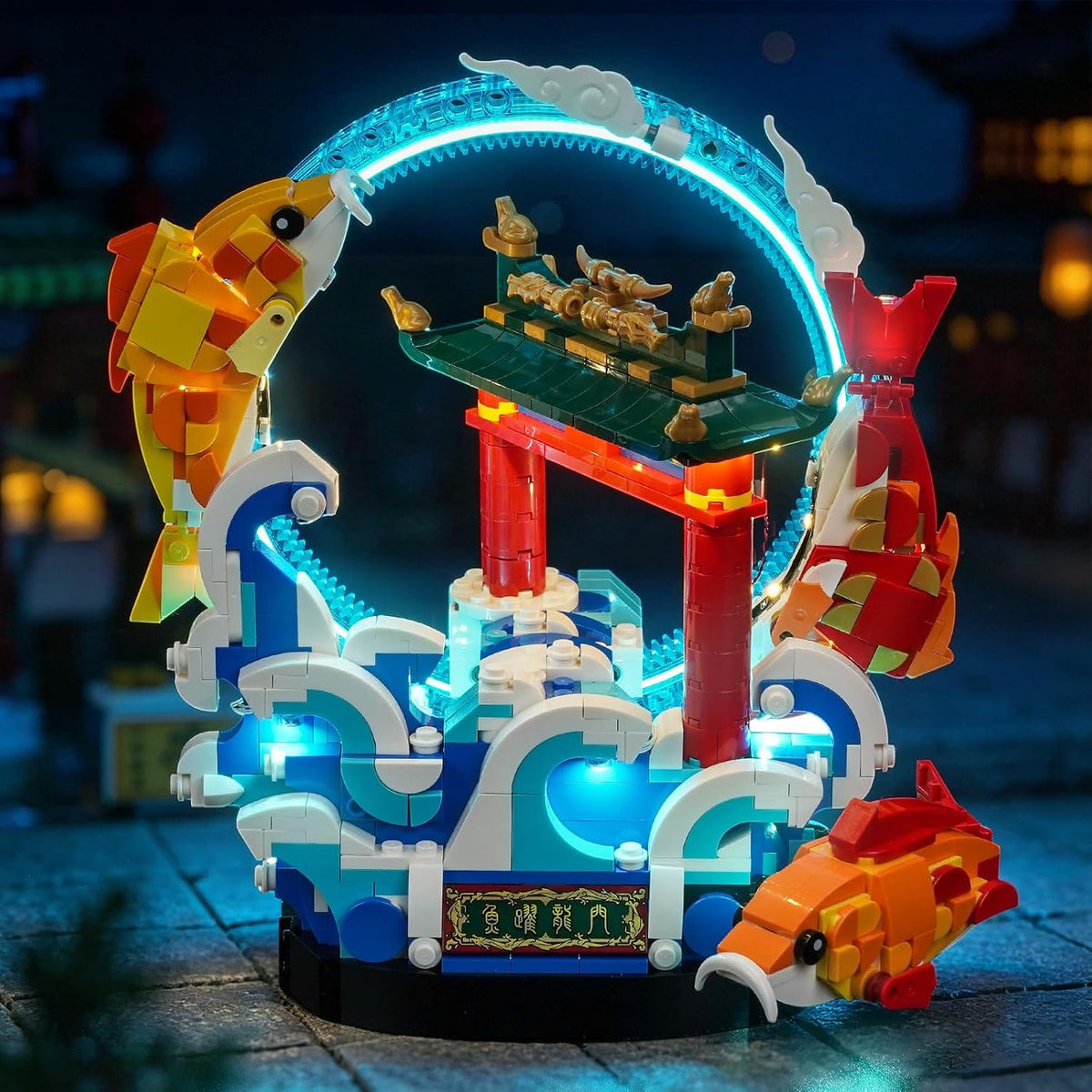 Brick-built leaping carp model lit by LED lights – view 2