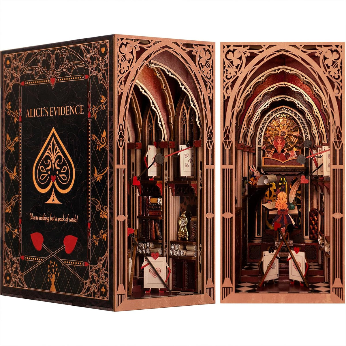 Lit fantasy castle book nook diorama standing between books on a shelf – view 3