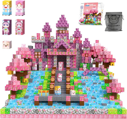Pink magnetic cube blocks built into a princess castle with cherry blossom trees