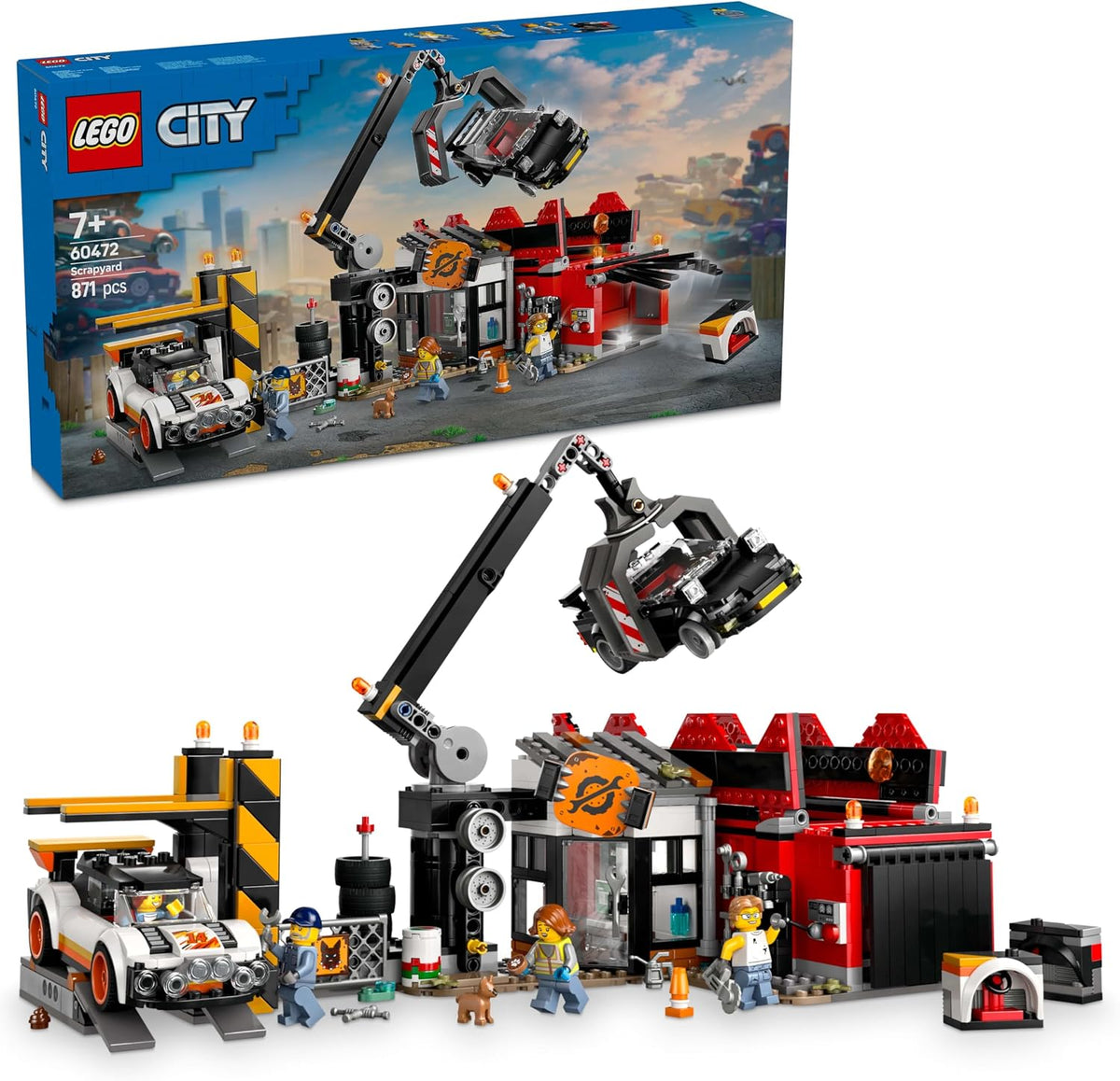 Brick-built scrapyard with crane lifting a scrap car into a compression machine