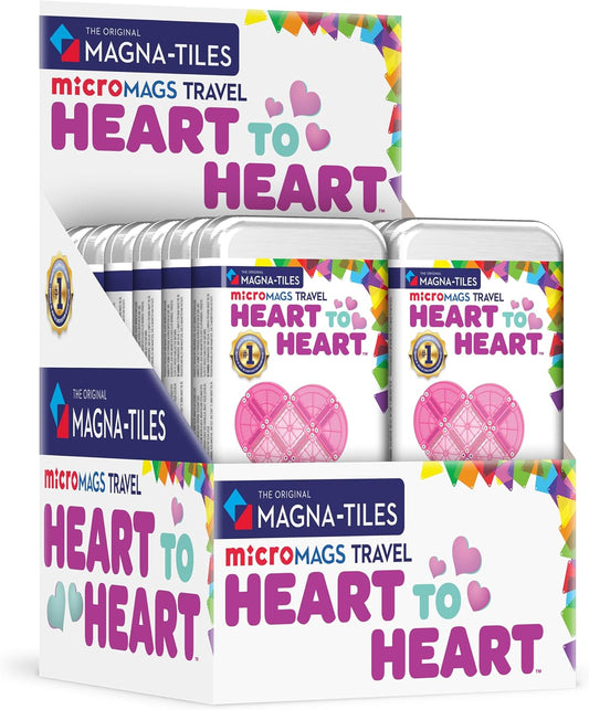 Pink, purple and teal glitter mini magnetic tiles built into a small heart-themed structure